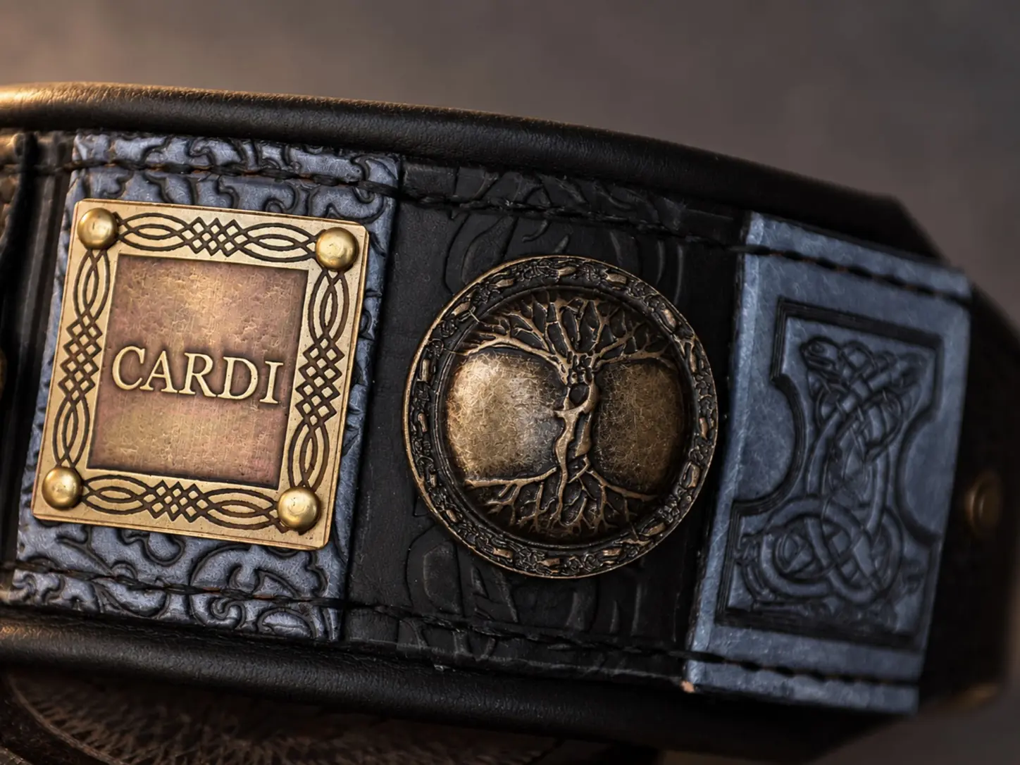 Custom embossed black leather dog collar ornaments detail
